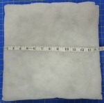 Measure pillow form for quilted pillow