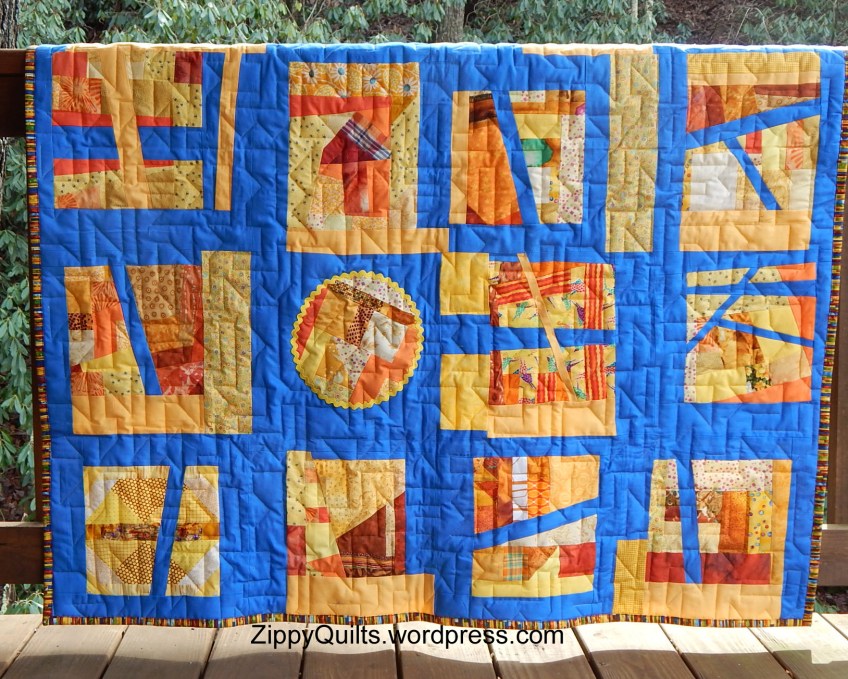 Improvisational quilt, orange and blue quilt