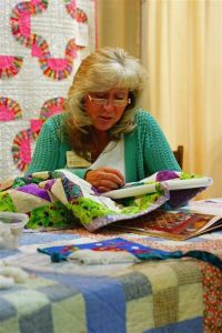 Connie Brown, hand quilting